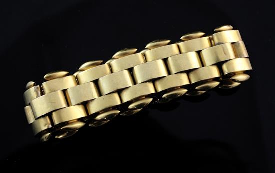 A late Victorian gold oval hollow link bracelet, 7in.